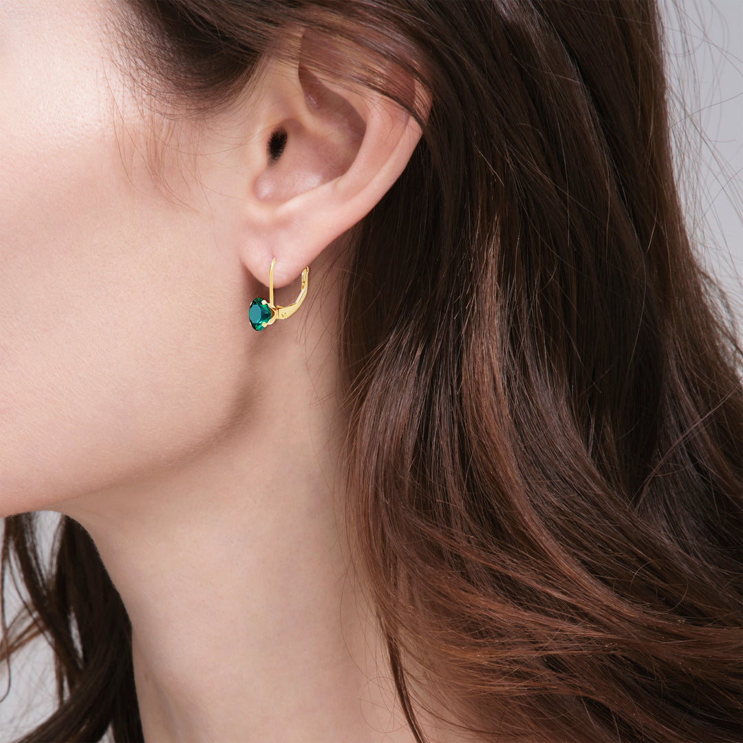 14K yellow gold lab-grown emerald leverback earring shown on model&