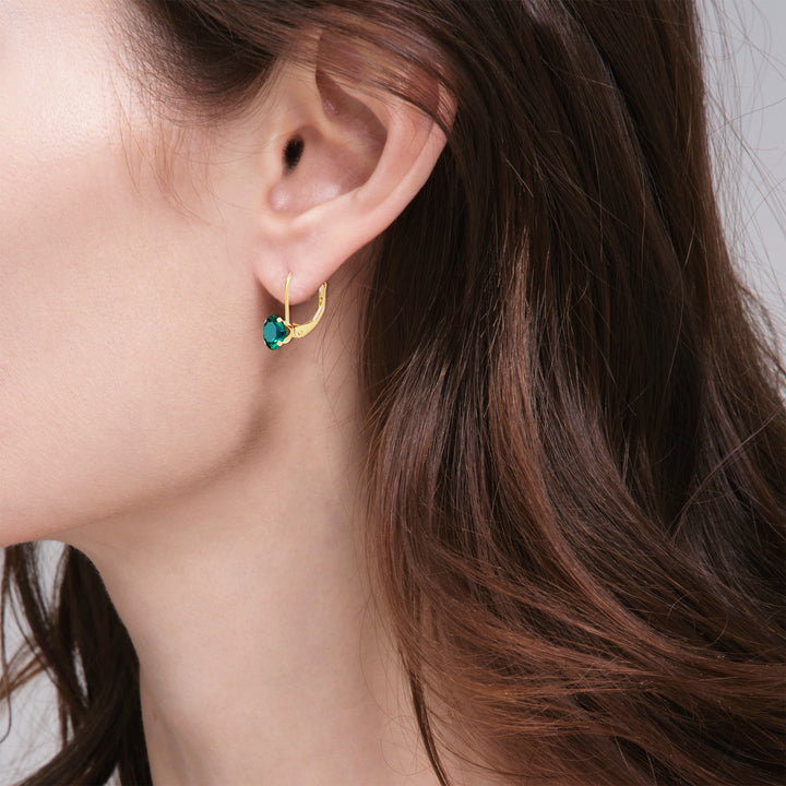 14K yellow gold lab-grown emerald leverback earring shown on model&