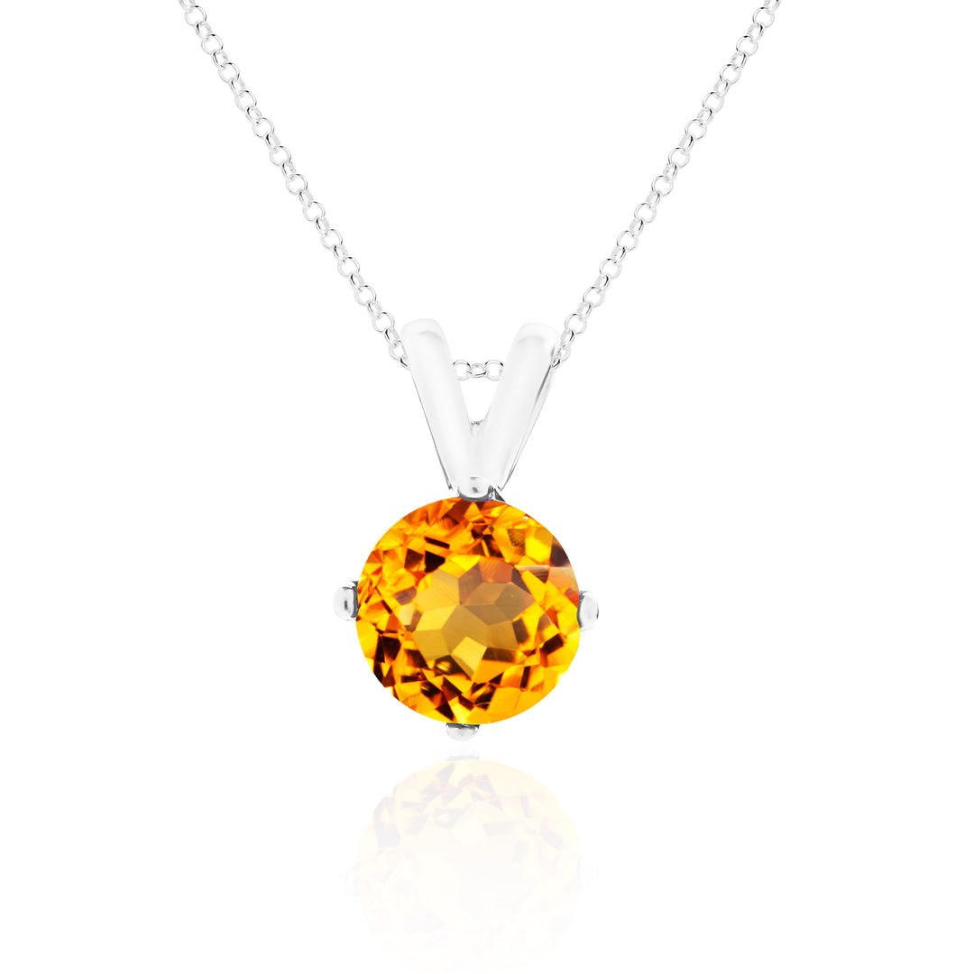 Sterling silver necklace with an 8mm round citrine pendant, vivid golden-honey hue, prong-set, rolo chain.
