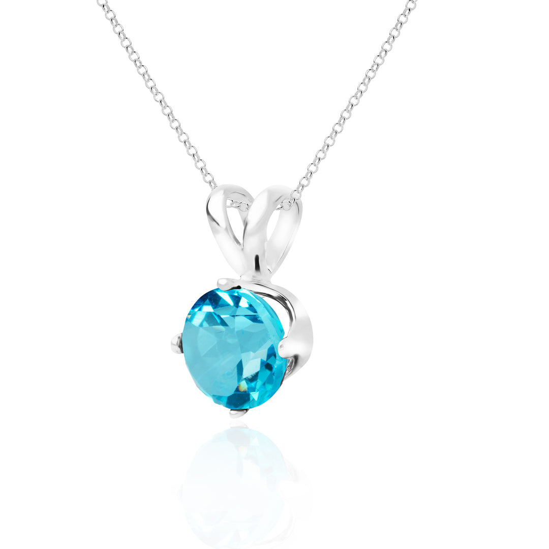 Side view of 8mm round Swiss blue topaz 4-prong solitaire pendant necklace in sterling silver on rolo cable chain

